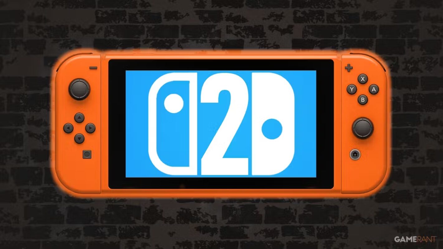 orange-nintendo-switch-2-mockup-on-dark-wall-neon-sign-light-blue-display-logo