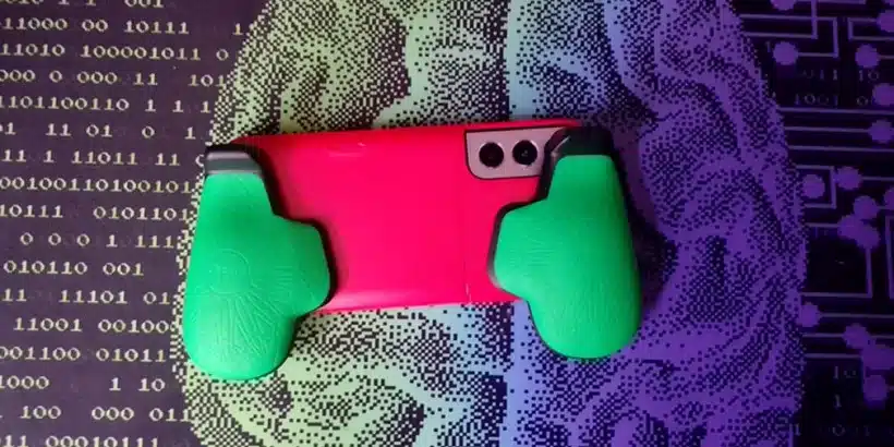 gamen.pro puk modular gaming hardware android ios green puk grips attached to phone in pink case 1 jpg 820