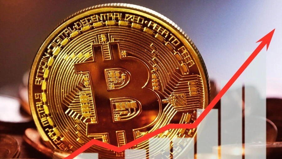 bitcoin-surges-to-new-record-high-113950121-16x9_0