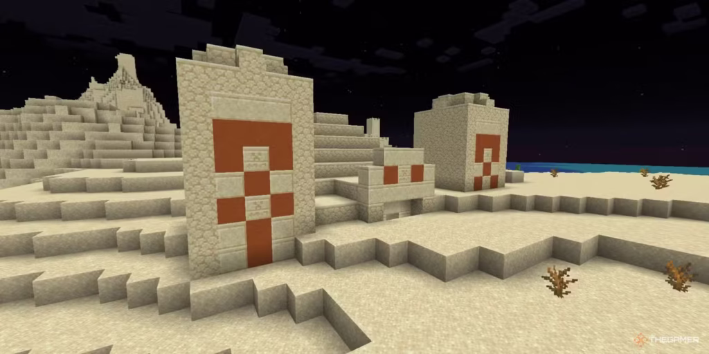 gamen.pro a desert pyramid temple structure in a desert biome with an ocean nearby in minecraft