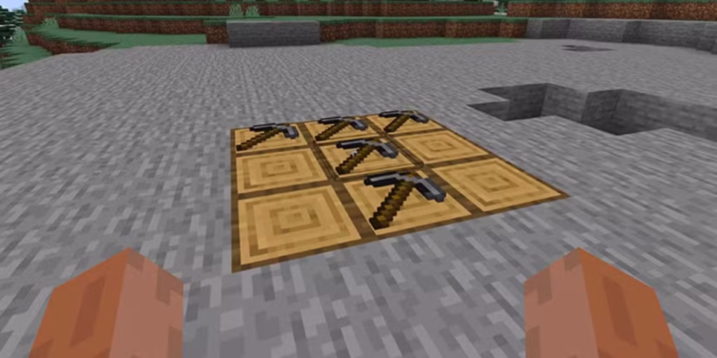 steve making stone pickaxes on the ground in the one block at a time april fools update of minecraft gamen.pro