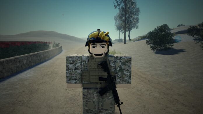 gamen.pro Roblox Peacekeepers blonde haird avatar in military uniform wearing a blue helmet standing in desert with gun equipped