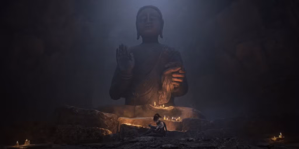 gamen.pro wuchang sat beneath a large statue of buddha